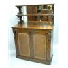 Image 1 : A late Regency rosewood chiffonier, with mirrored double shelf back over two arched panelled door...