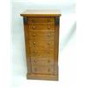 Image 1 : A Victorian mahogany Wellington chest with seven graduated drawers and locking bar on plinth base...