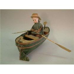 A good clockwork rowing figure automaton, featuring doll-like female with Schoenan & Hoffmeister...
