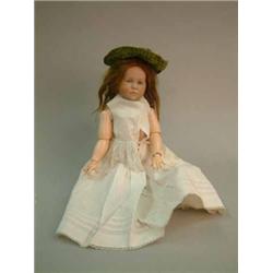 A good Kammer & Reinhardt bisque character doll, mould 101, with painted intaglio eyes, closed mo...