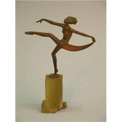 A Lorenzl bronze figure of a dancing girl on damaged green onyx plinth 8ins...
