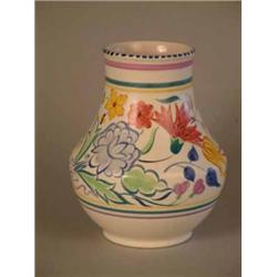 A Poole pottery vase with floral decoration 6.75in....