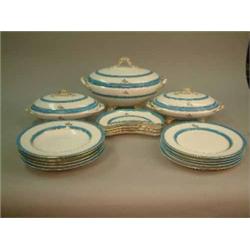 A late Victorian 17-piece porcelain dinner service, with gilt turquoise borders, retailed by Dani...