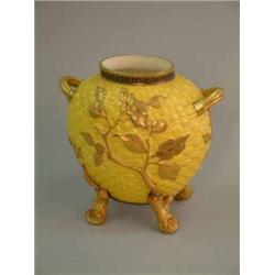 A Royal Worcester yellow glazed basket moulded vase, with rustic feet 7in....