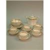 Image 1 : A Newhall 14-piece part tea set, with gilt floral banding and spiral fluted moulding....