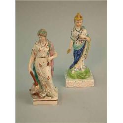 A late 18th century Staffordshire figure of Victory, standing on a square base, 8ins and a simila...