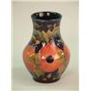 Image 1 : A Moorcroft pomegranate pattern baluster vase, green William Moorcroft signature 5.75in....