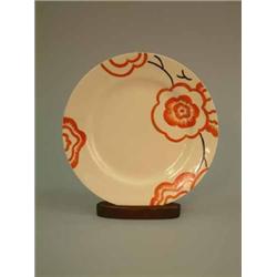 A Clarice Cliff Bizarre dinner plate, decorated with red flowers, 10ins...