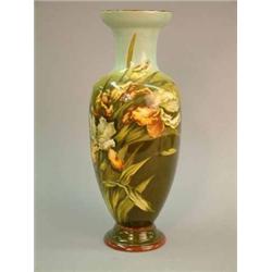 A Doulton faience baluster vase, decorated with irises, by Mary Butterton. 18ins...