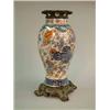 Image 1 : A Japanese porcelain charger, decorated with figures around a landscape, 18.5ins...