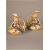 Image 1 : A pair of Locke & Co. blush ewers, decorated with peacocks 4.25in....