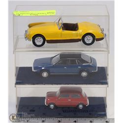 SET OF 3 MODEL CARS IN DISPLAY CASES