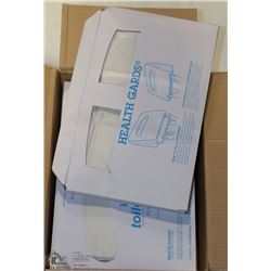BOX OF TOILET SEAT COVERS