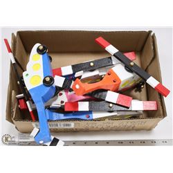FLAT OF HANDMADE WOODEN HELICOPTERS