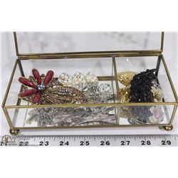 GLASS MIRRORED CASE FILLED WITH VINTAGE HAIR CLIPS
