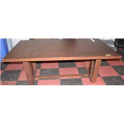 LARGE WOOD TONE KITCHEN TABLE CORNER DAMAGE