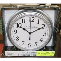 HERALD AND BARNES WALL CLOCK  SILVER FRAME