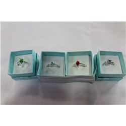 FOUR LADIES DINNER RINGS