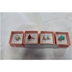 FOUR GEMSTONE RINGS