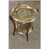 Image 1 : FOLDING CARVED MAHOGANY TABLE WITH TWO ORNATE BRASS TRAYS