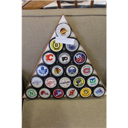 FRAMED VINTAGE HOCKEY PUCK COLLECTION