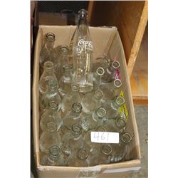 BOX OF GLASS COKE BOTTLES