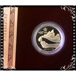 MRC: 1987  $100 Gold Coin Despic a Hand Carrying the Olympic Torch 14K 13,88gr 6% premium Only
