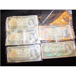 Four $1 Bills. One $5 Bill - 1954, 1973, 1979