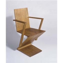 GERRIT RIETVELD ZIG ZAG CHAIR WITH ARMRESTS, CA. 1940 MANUFACTURED BY G. A. VAN DE GROENEKAN; OAK...