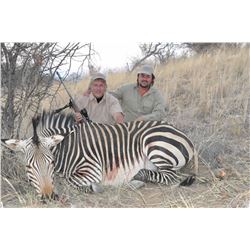 Namibian safari for 2 hunters to each pursue a Hartman Zebra and a Blue Wildebeest (10 days)