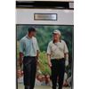 Image 2 : FRAMED PHOTO OF TIGER WOODS AND JACK NICKLAUS, MATTED WITH COLLECTIBLE COURSE PINS