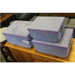 THREE PURPLE STORAGE BOXES