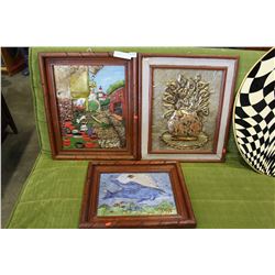 THREE FRAMED METAL RAISED MOTIF PICTURES