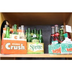 LOT OF SIX VINTAGE UN OPENED POP BOTTLES AND TWO SIX PACKS OF VINTAGE POP BOTTLES