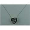 Image 1 : ONE 14KT WHITE GOLD BLACK CULTURED PEARL AND BLACK DIAMOND HEART SHAPED PENDANT. ONE BLACK CULTURED