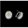 Image 2 : Hammered Metal Oval Earrings - Rhodium Plated