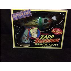 IN BOX OFFICIAL FUTURAMA COLLECTIBLE TIN TOY GENUINE  ZAPP BRANNIGAN SPACE GUN