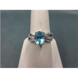 2.5 CT Oval Blue Topaz & Diamond Ring