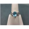 Image 1 : 2.5 CT Oval Blue Topaz & Diamond Ring