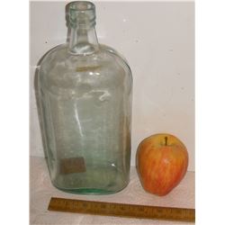 Very very very old glass bottle  curved sides #37- tres vielle bouteille en verre aux cotes arrondis
