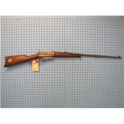 EN.--  Winchester; Model 1895; 30 US ( 30-40 Krag); Lever; US Silver Dollar Embedded in Stock; Ser #