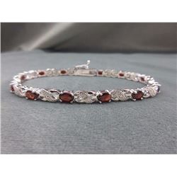 BRACELET - 6CTW OVAL FACETED GARNETS (12) & DIAMOND IN STERLING SILVER FIGURE 8 DESIGNED LINKS - INC