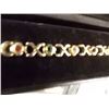Image 1 : GOLD BRACELET WITH STONES