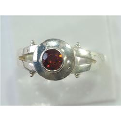 RING - ROUND FACETED GARNET IN STERLING SILVER SETTING - RETAIL ESTIMATE $200