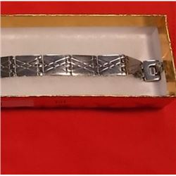 BRACELET - NEW STAINLESS STEEL - WITH ETCHED DESIGN - RETAIL ESTIMATE $125