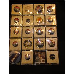 (19) Political Pin-backs and etc. in a plastic coin page.