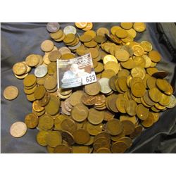 A nice mess of Lincoln Cents, I never counted, never checked for dates. What you see is what you get