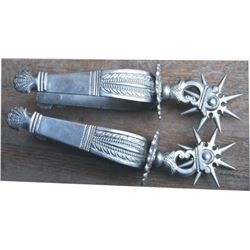 large ornate Spanish-Colonial spurs