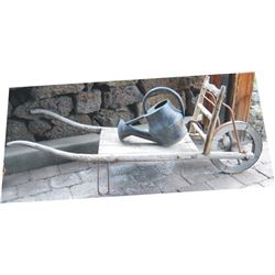 neat primitive large wooden wheel barrow