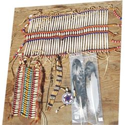 Indian decorator pieces, two breast plates, feathers and beaded choker